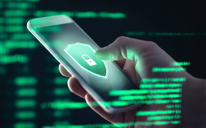 A hand on a digital device touches screen image of a protective lock symbol.